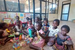 CHILDREN-PLAYING-WITH-TOYS-AND-HAPPY