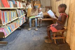 Children-reading-in-container-library-1-scaled